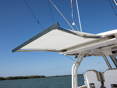S 328 Sport boat stowable cockpit sunshade open.