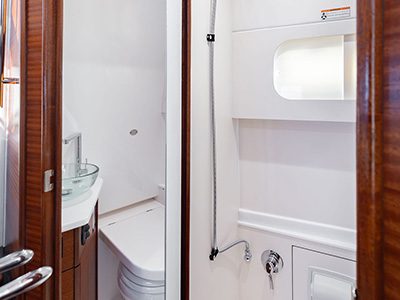A full shower with mirror on the Pursuit S 388 Sport center console boat.