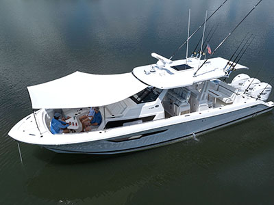 Aerial view of Pursuit S 388 with forward sunshade installed.