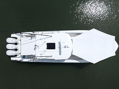 Overhead view of Pursuit Boat S 388 with forward sunshade installed.