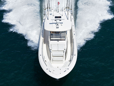 Dramatic shot of Pursuit Boats S 388 Center Console.