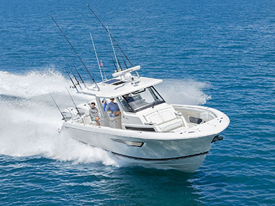 The Pursuit Boats S 388 Sport Center Console runs toward the camera.