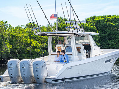Mother and son relax and enjoy the view on the Pursuit S 388 Sport Center Console boat.