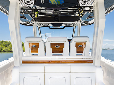 Aft seating with Garmin screen and JL audio speakers on Pursuit Boats S 388.