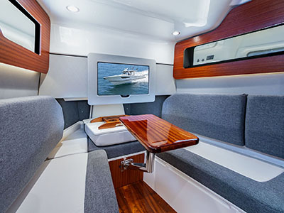 Cabin view with table on Pursuit Boats S 388.
