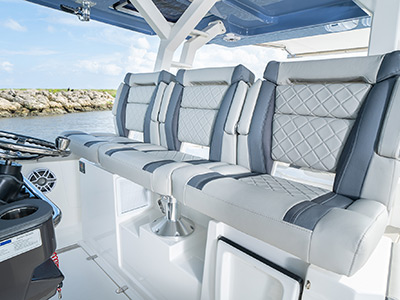 A view of the helm seating of the S 428 Pursuit Sport Center Console Boat.