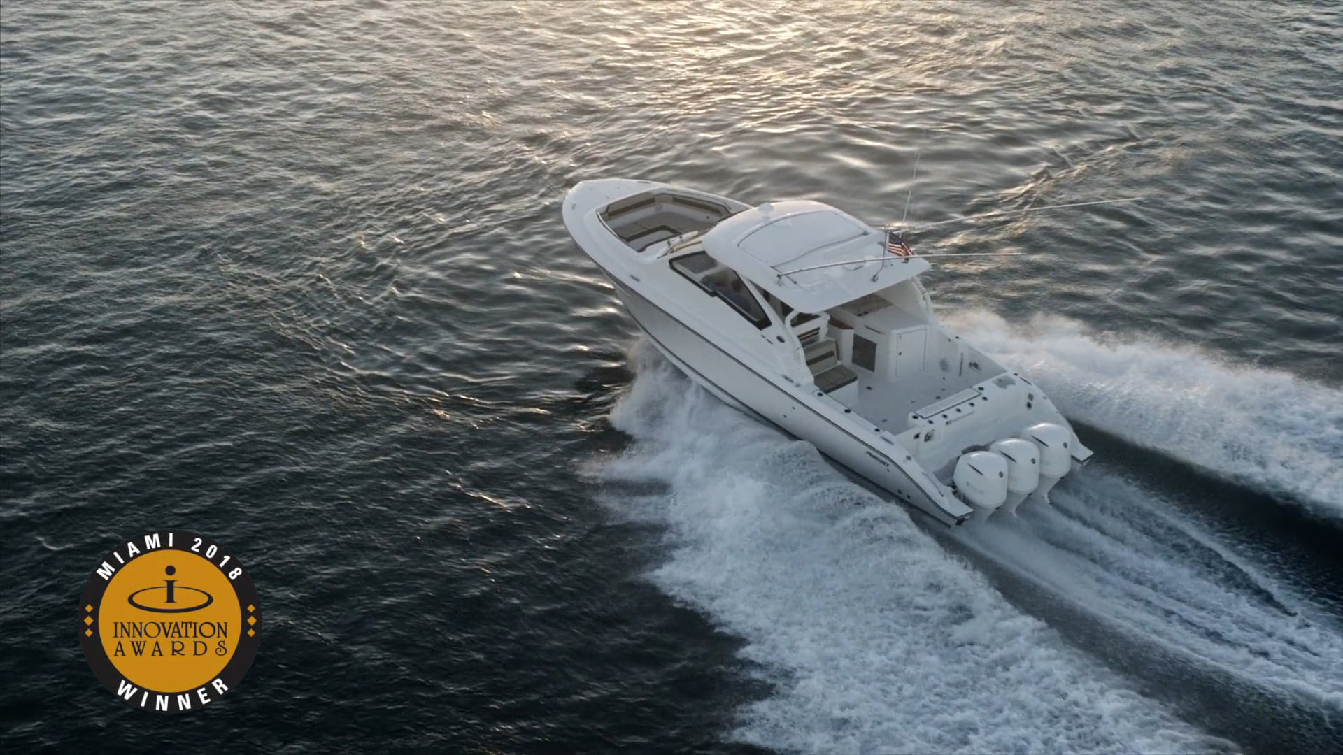 Aerial view of white Pursuit D 365 Denail dual console boat.