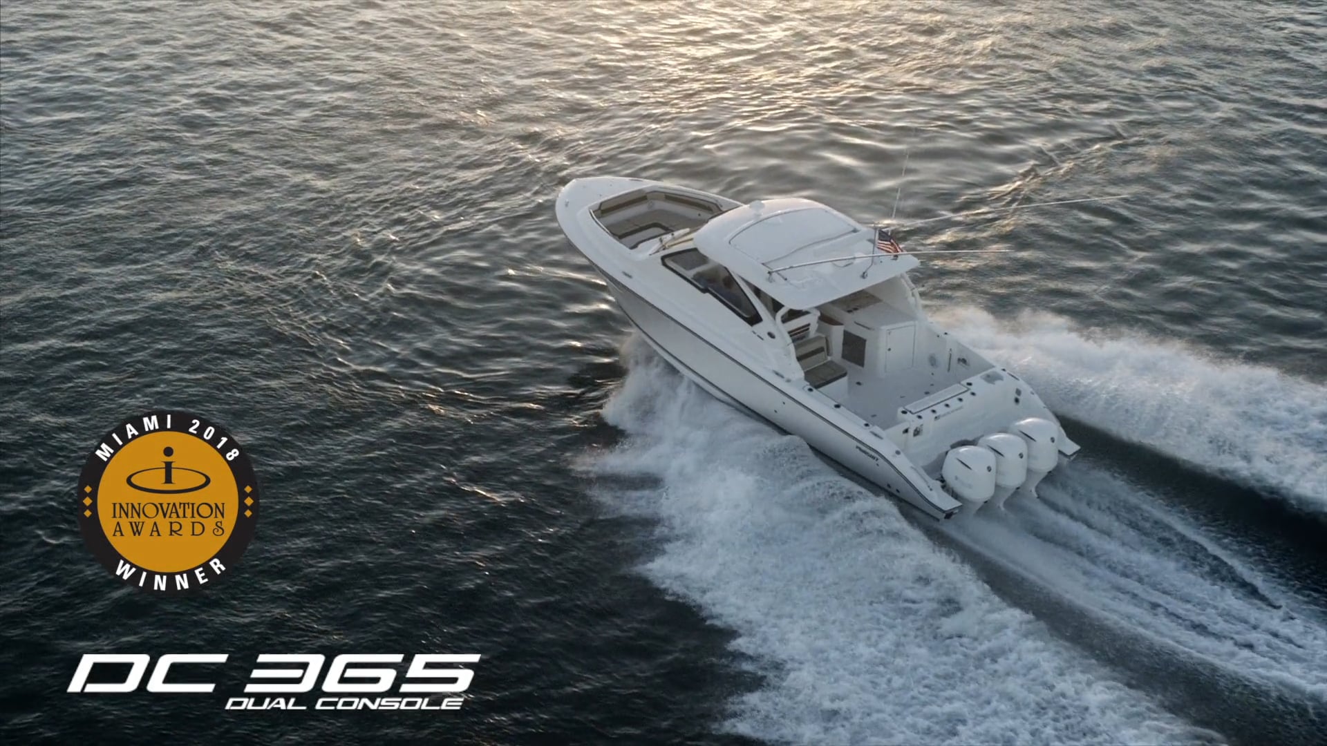 Aerial view of white Pursuit DC 365 dual console boat.