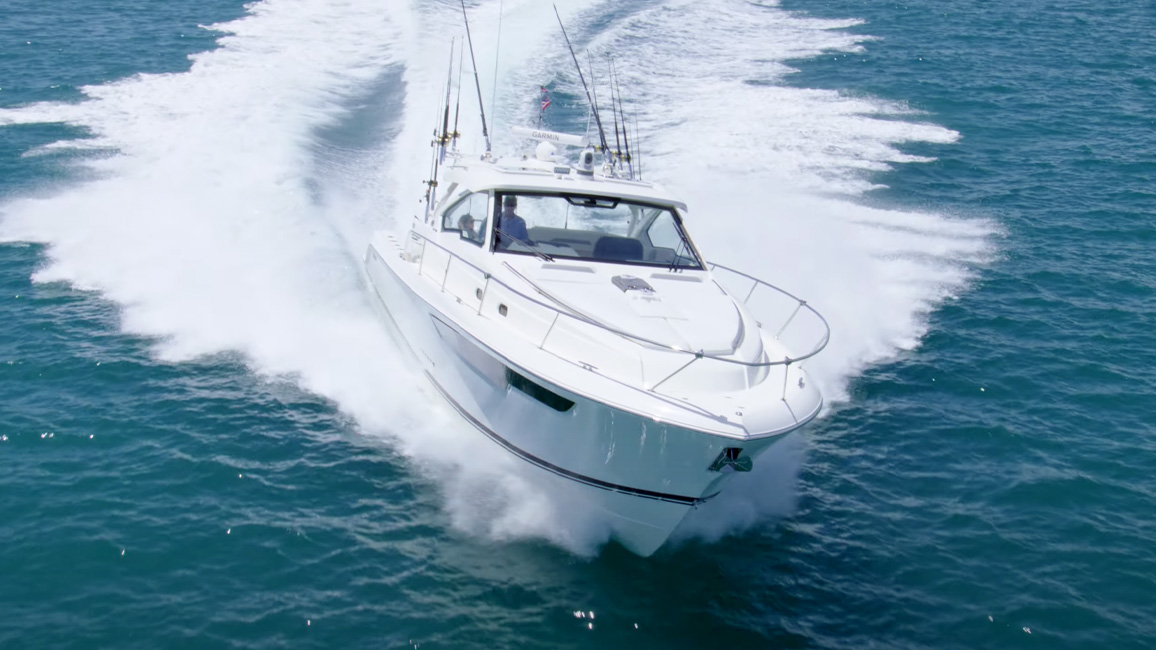 OS 405 Offshore Pursuit Boat running toward us.