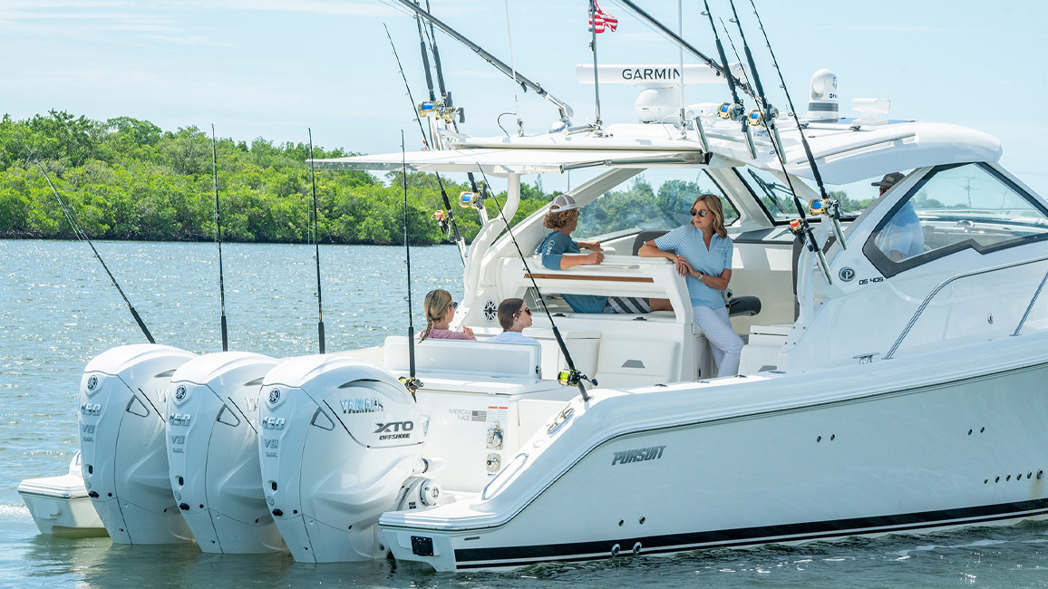 People enjoy a day on an Offshore Pursuit Boat OS 405.