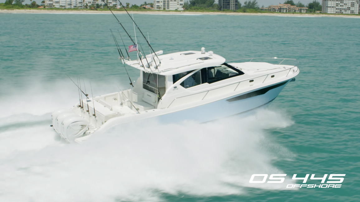 A photo with a view of the starboard side of the Pursuit Boats OS 445 Offshore.