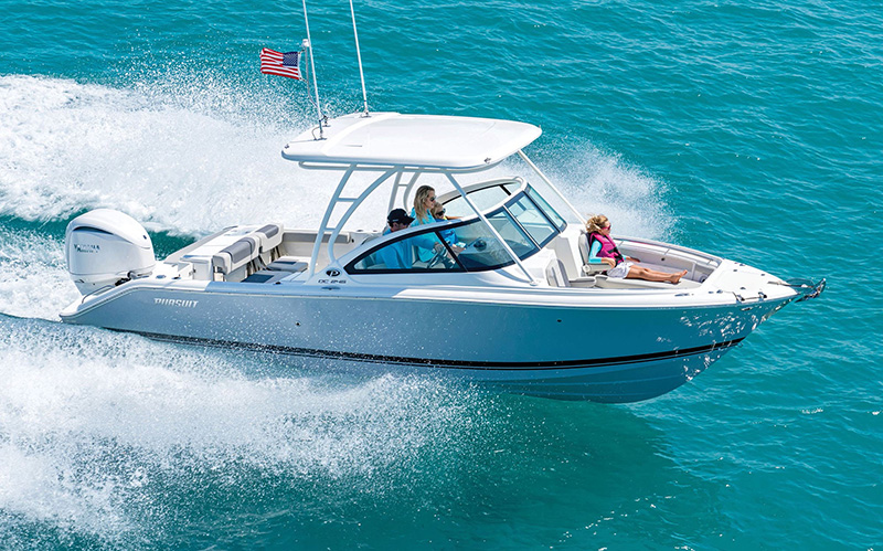 DC 246 Pursuit dual console boat running right in the offshore.