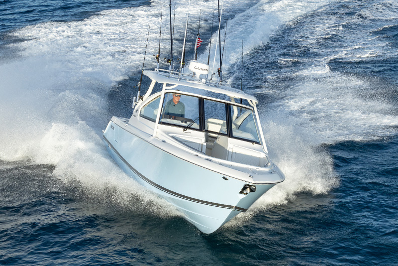 Shot of a Pursuit Boat cruising offshore.