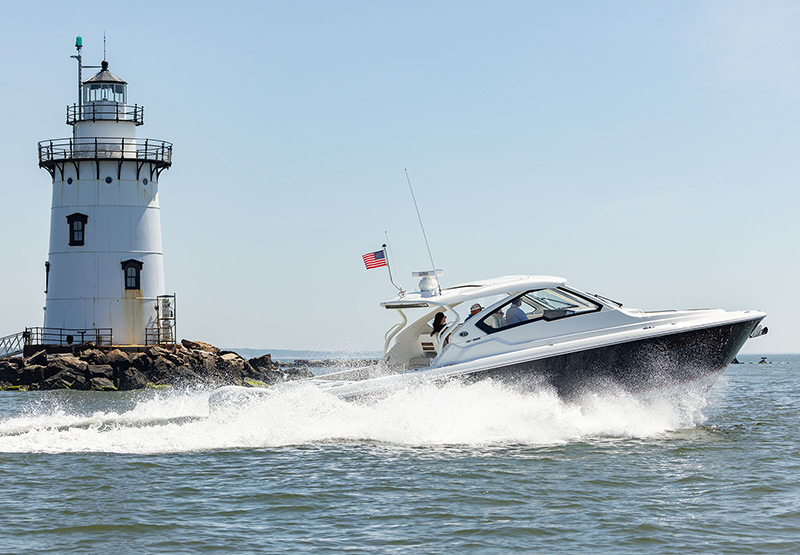 Cruising by the Saybrook Breakwater Lighthouse in Connecticut.