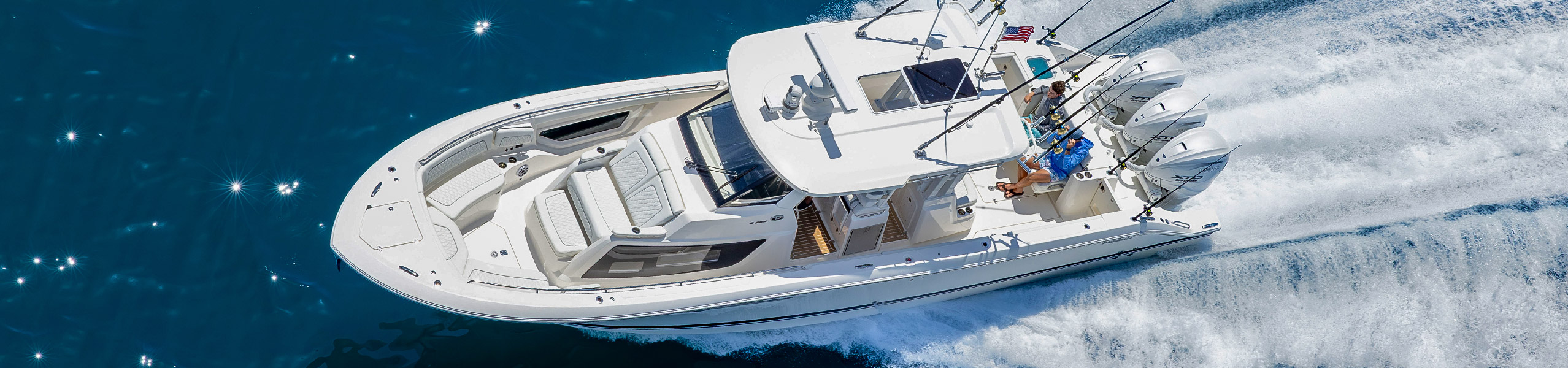 Overhead shot of a Pursuit Sport Center Console S 388 fishing boat with cabin.