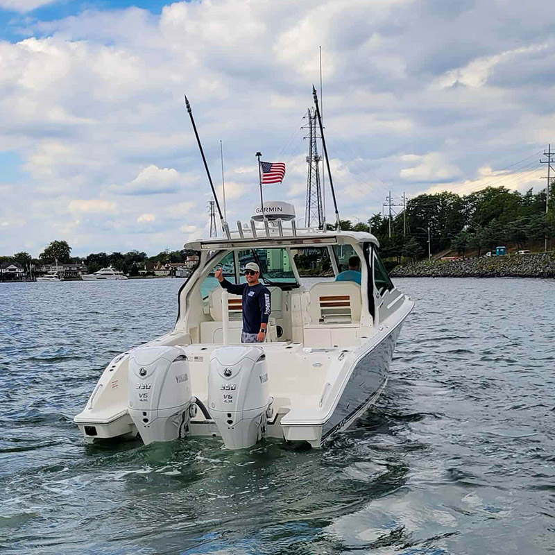 A man on his new DC 326 Dual Console giving a thumbs up.