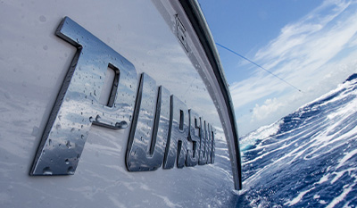 Photo of Pursuit on side on hull.