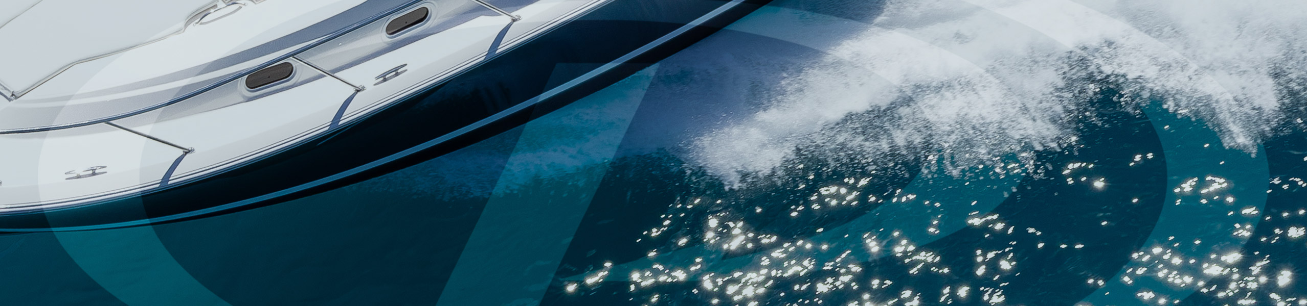 PURSUIT emblem ghosted over a background of water.